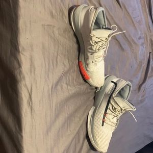 Under Armour. Curry’s. White. 9.5 in size